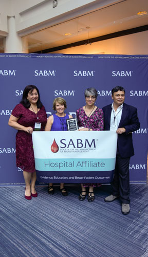 Representatives from SABM awarding a hospital affiliate certification to representatives from Duke Center for Blood Conservation