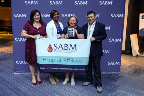 Representatives from SABM awarding a hospital affiliate certification to representatives from Pennsylvania Hospital