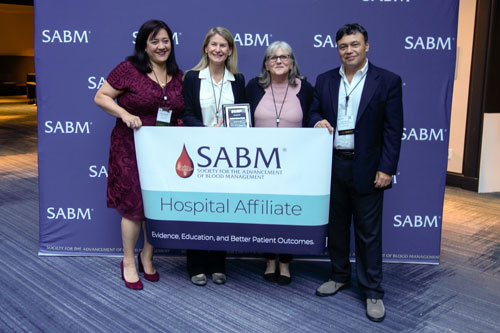 Representatives from SABM awarding a hospital affiliate certification to representatives from Swedish Medical Center